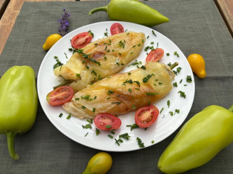 Pan-fried peppers stuffed with cheese, chives and tomatoes