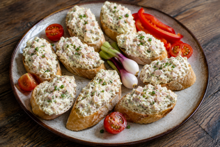 Celery spread with cottage cheese, Dijon mustard and ham served on toasted baguette slices