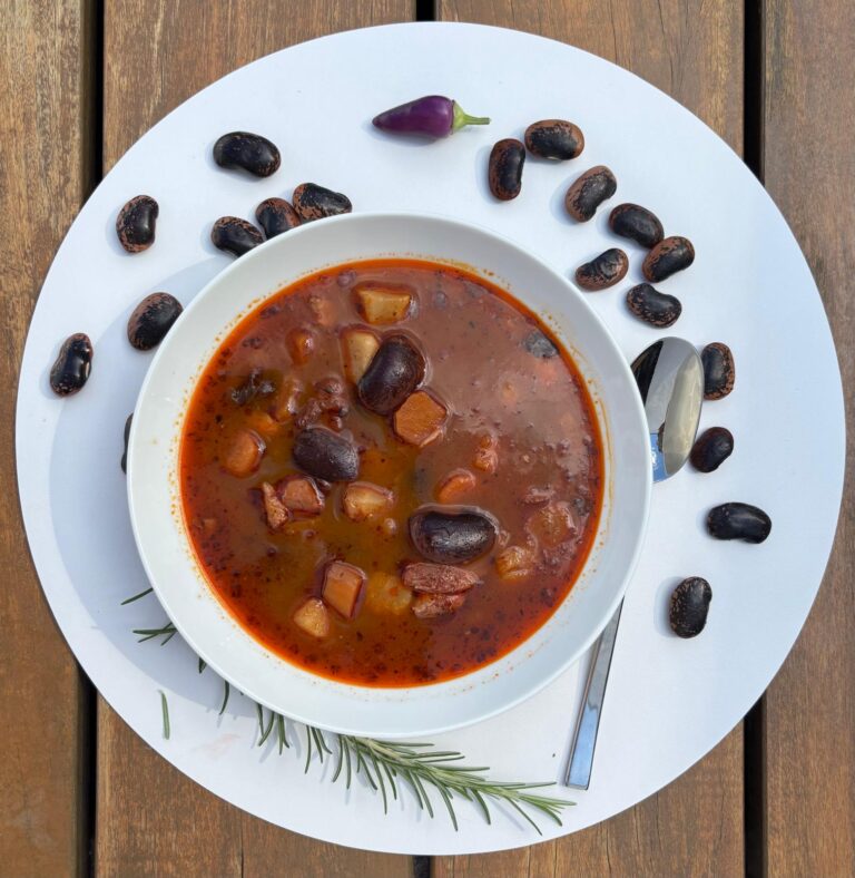 Slovak kettle bean soup with smoked meat and sausage