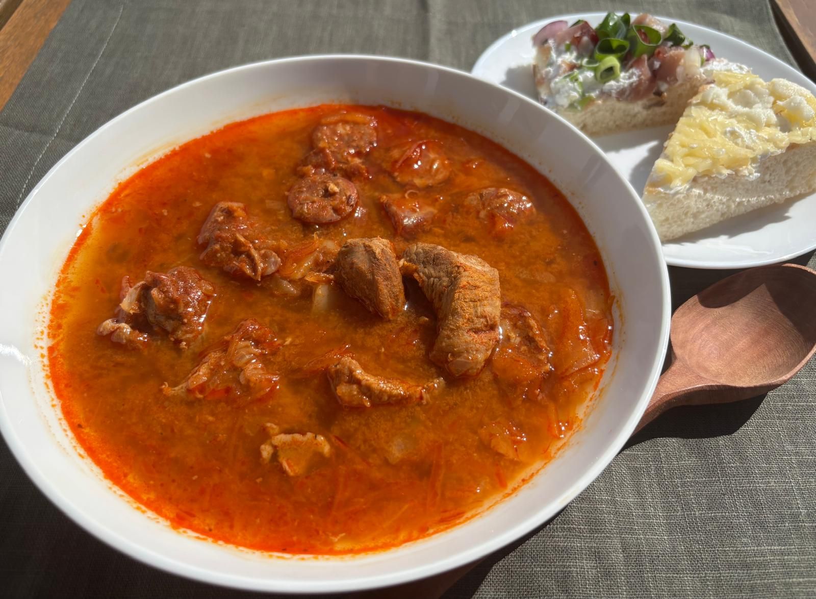 Traditional Slovak Kapustnica with smoked pork, sausage and wild mushrooms